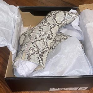 Ankle crocodile boots. Brand new in original box. Size 8 and a half.